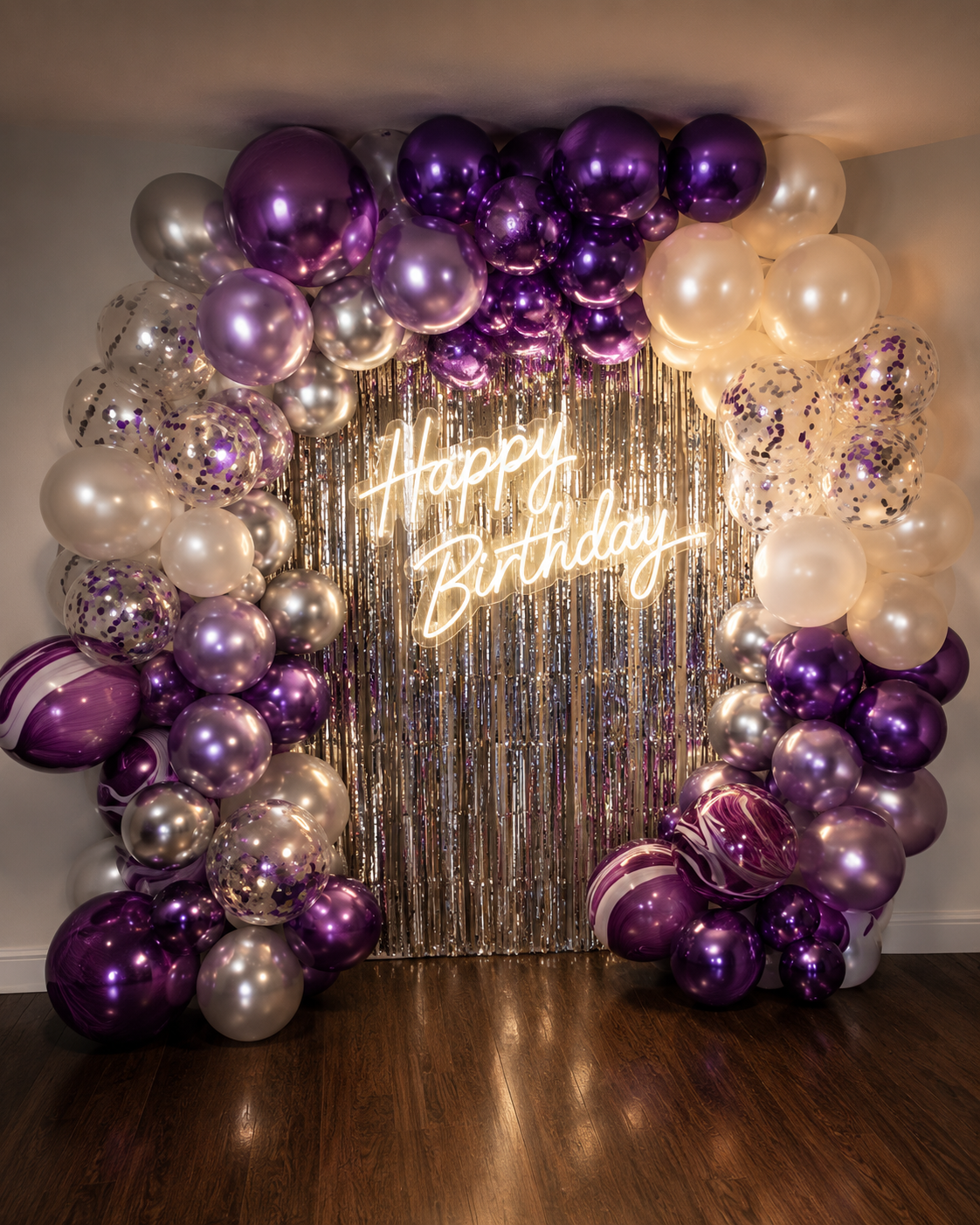 Purple balloon backdrop with neon sign